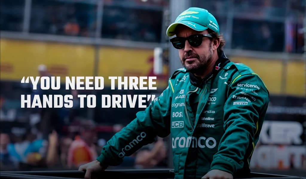 Fernando Alonso in Aston Martin team gear with the quote: “You need three hands to drive.”