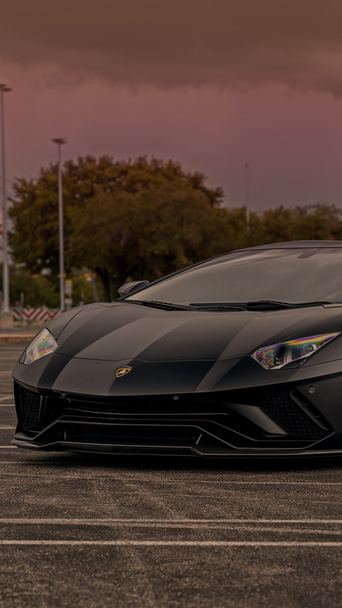 Ignition Lamborghini Aventador in a parking space.