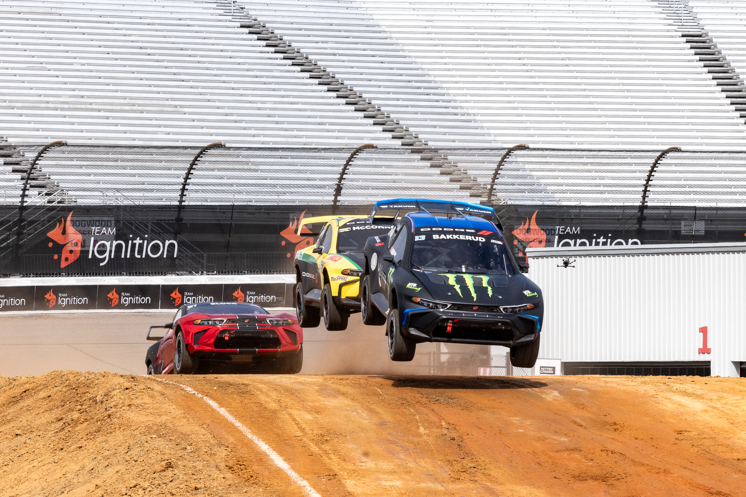 Ignition Casino signage behind Nitrocross rally cars racing in Richmond, Virginia